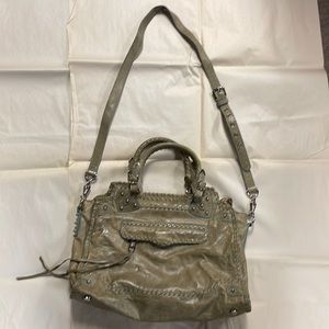 Light distressed khaki w/ light blue seams & silver hardware & spike details.